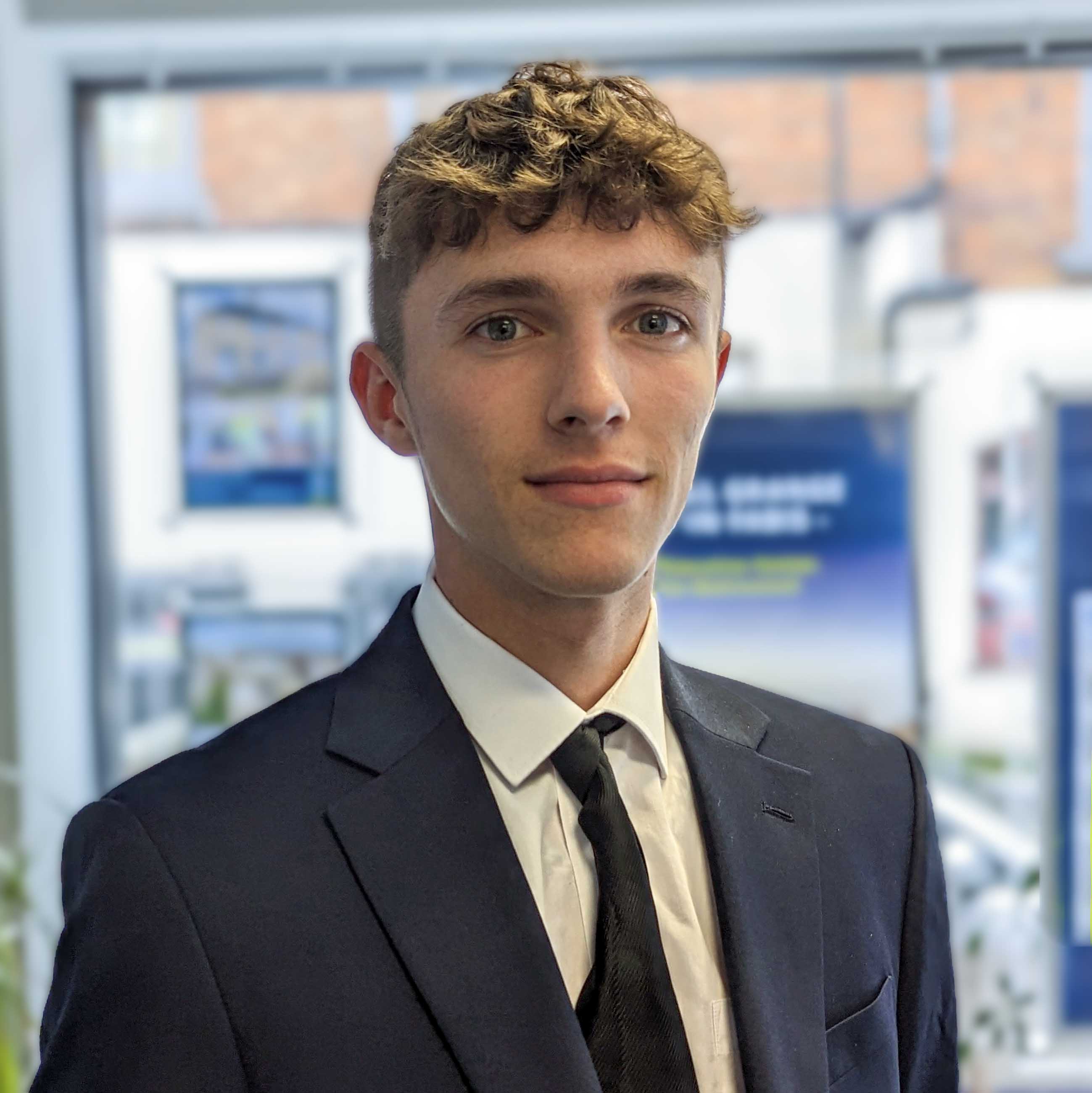 SID COX, TRAINEE